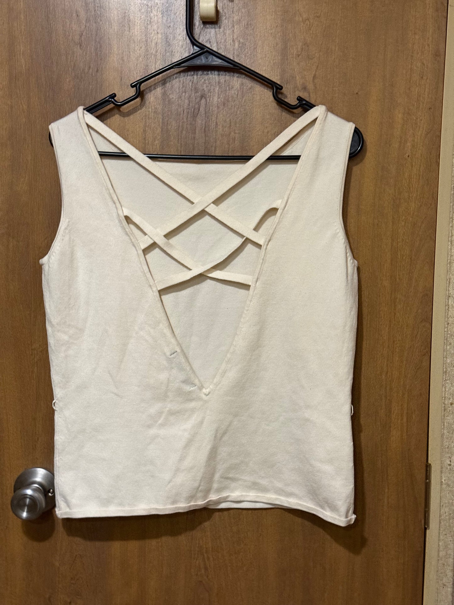 Sleeveless sweater with very cute criss cross back